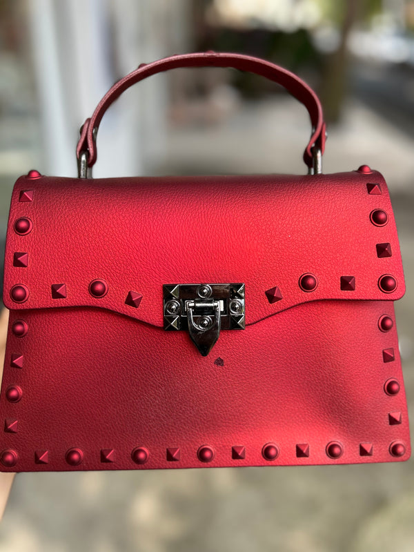 Bolso Taches con Defecto